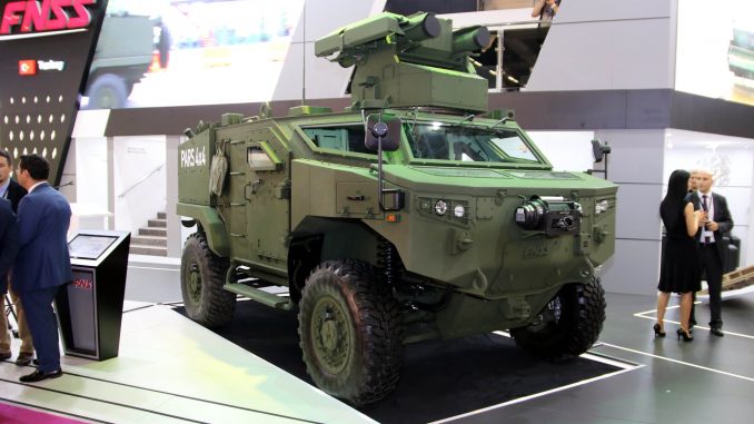 المركبة البرمائية رباعية الدفع والمضادة للدبابات التركية "بارس" (Pars 4x4) في جناح شركة "أف أن أس أس" خلال معرض الدفاع الدولي "يوروساتوري 2018" (موقع تويتر الرسمي لشركة FNSS) المركبة البرمائية