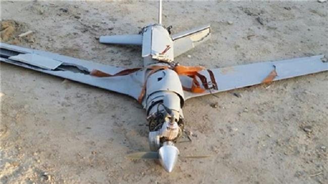 حطام طائرة سعودية من دون طيار أسقطتها القوات اليمنية في مكان لم يكشف عنه (‏Press TV‏)‏