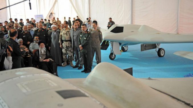 المرشد الأعلى الإيراني آية الله علي خامنئي يجلس بالقرب من طائرة RQ-170 التي تم التقاطها في 11 أيار/مايو 2014. تحطمت الطائرة غير المأهولة في إيران في كانون الأول/ديسمبر 2011. (وكالة فرانس برس عبر موقع الزعيم الإيراني) المرشد الأعلى الإيراني آية الله علي خامنئي يجلس بالقرب من طائرة RQ-170 التي تم التقاطها في 11 أيار/مايو 2014. تحطمت الطائرة غير المأهولة في إيران في كانون الأول/ديسمبر 2011. (وكالة فرانس برس عبر موقع الزعيم الإيراني)
