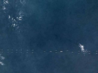 الأقمار الصناعية رصدت عشرات السفن الحربية الصينية في 26 آذار/ مارس 2018 (وكالة رويترز للأنباء)