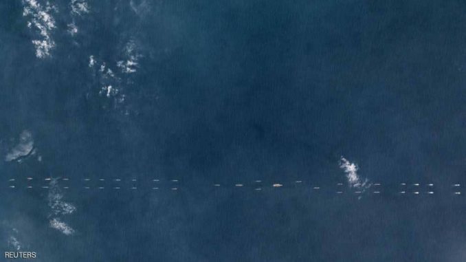 الأقمار الصناعية رصدت عشرات السفن الحربية الصينية في 26 آذار/ مارس 2018 (وكالة رويترز للأنباء)