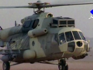 صورة مأخوذة من لقطات قدمتها قناة النهار الجزائرية في 18 كانون الثاني/يناير 2013 تظهر مروحية من طراز "مي-8" تابعة للقوات الجوية الجزائرية تحلّق في الصحراء في مكان غير معلوم في جنوب البلاد (AFP)